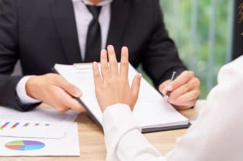 Customer or woman says no when businessman giving pen for signing a contract. declining executor role concept